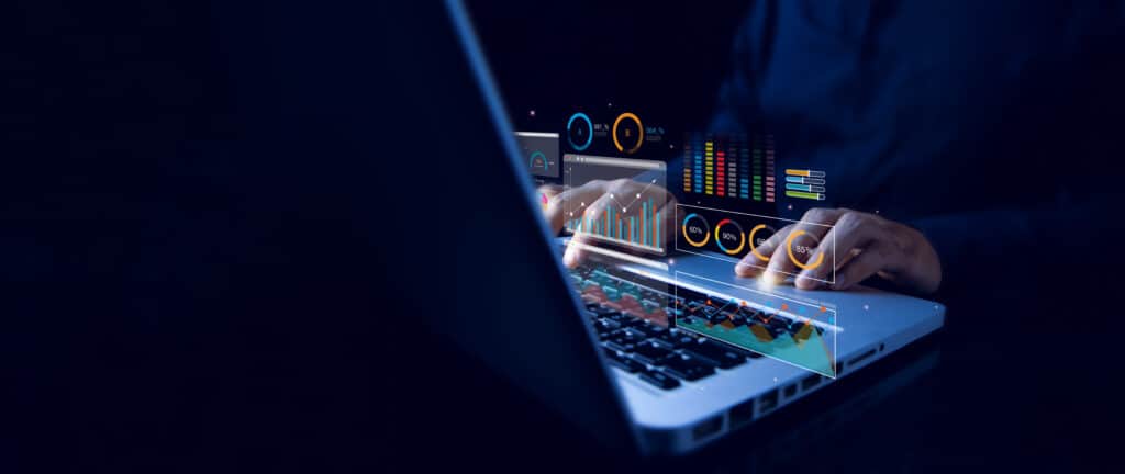 Analyst working with computer in Business Analytics and Data Management System with KPI and metrics connected to the database for technology finance, operations, sales, marketing. Data analysis.Ai