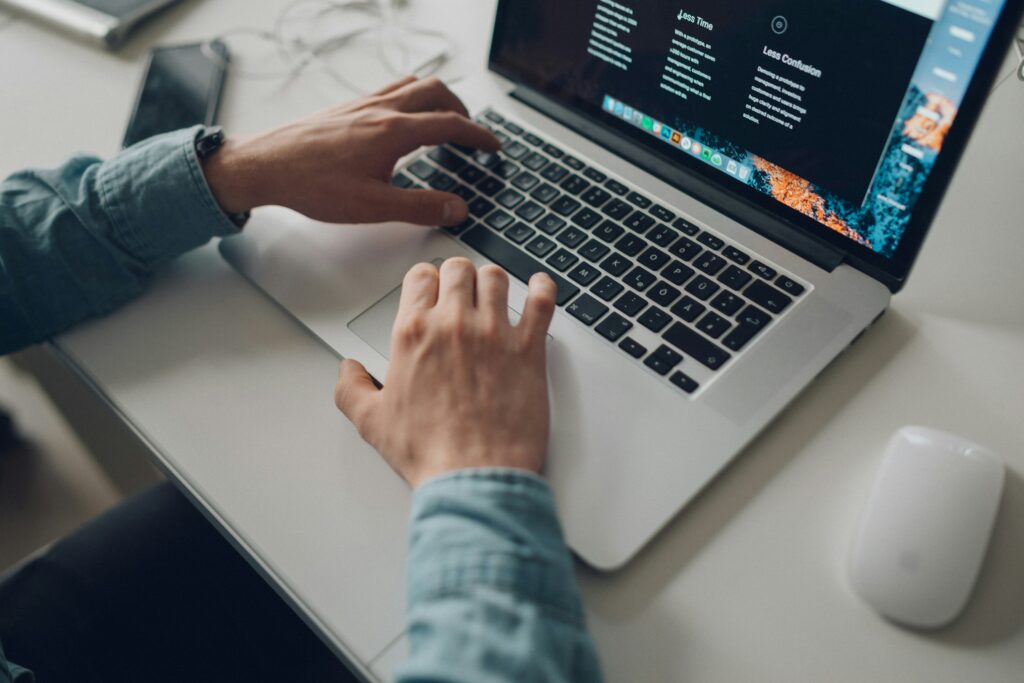 stefan-stefancik-5p_7M5MP2Iw-unsplash Man working on his website's link building strategy for SEO.